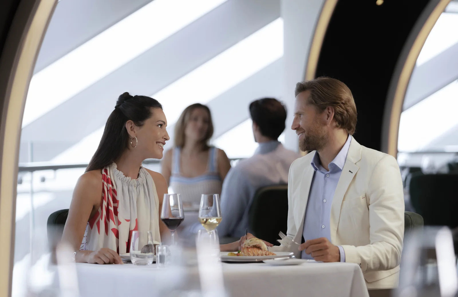Couple dining in the MSC Yacht Club restaurant
